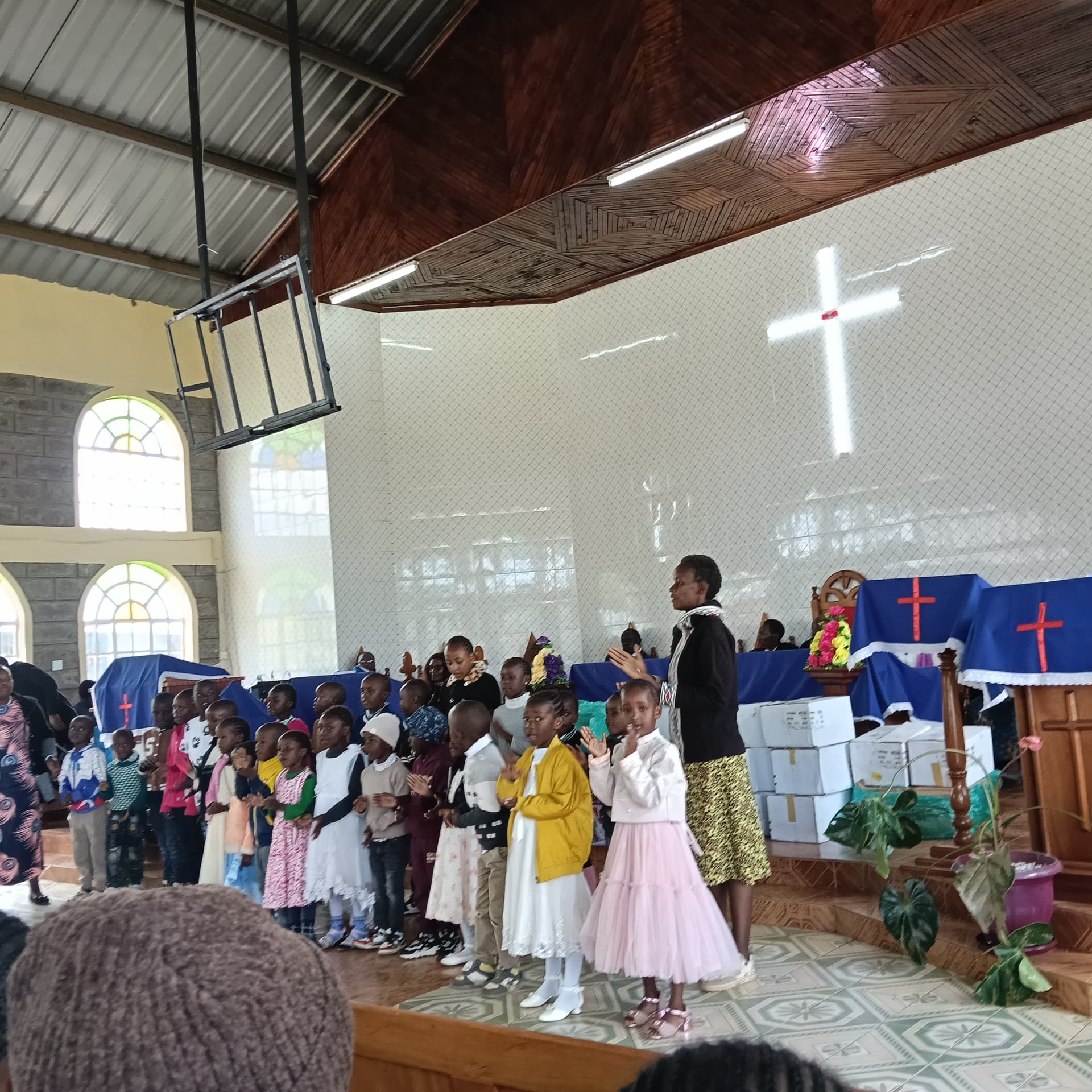 Children of the parish singing at the ceremony.