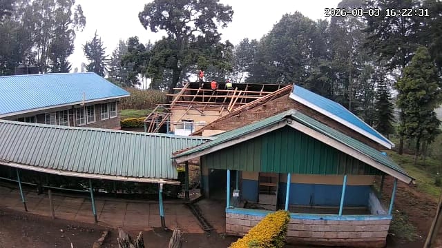 The clinic mid-works, with new timber framing going up.