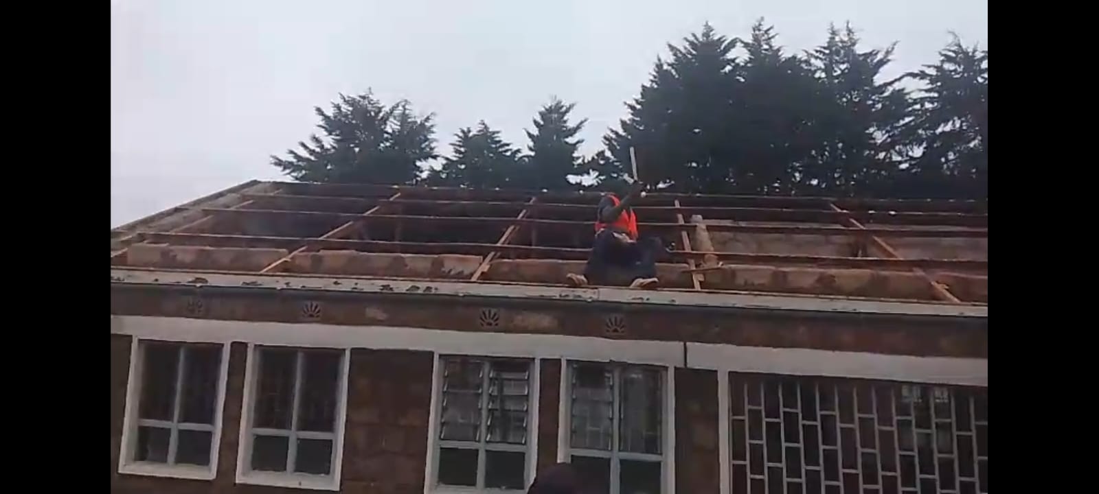 Stripping the old roof before the rainy season arrives.