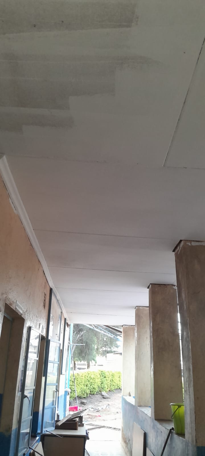 The outdoor waiting area after re-ceiling and a fresh coat of paint.