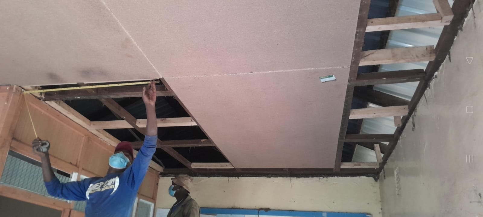 Measuring and rebuilding interior ceilings damaged by leaks.